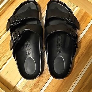 Women's narrow size 36 Birkenstock sandals. Black